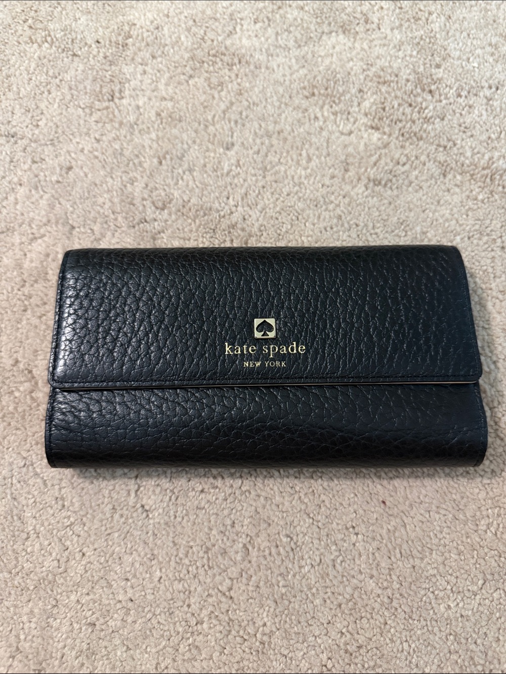 kate spade Black Pebbled Leather Fold Wallet with Gold Logo